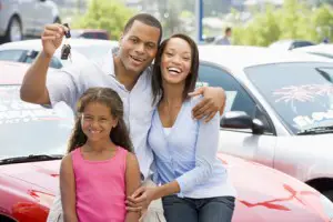 Family collecting used car
